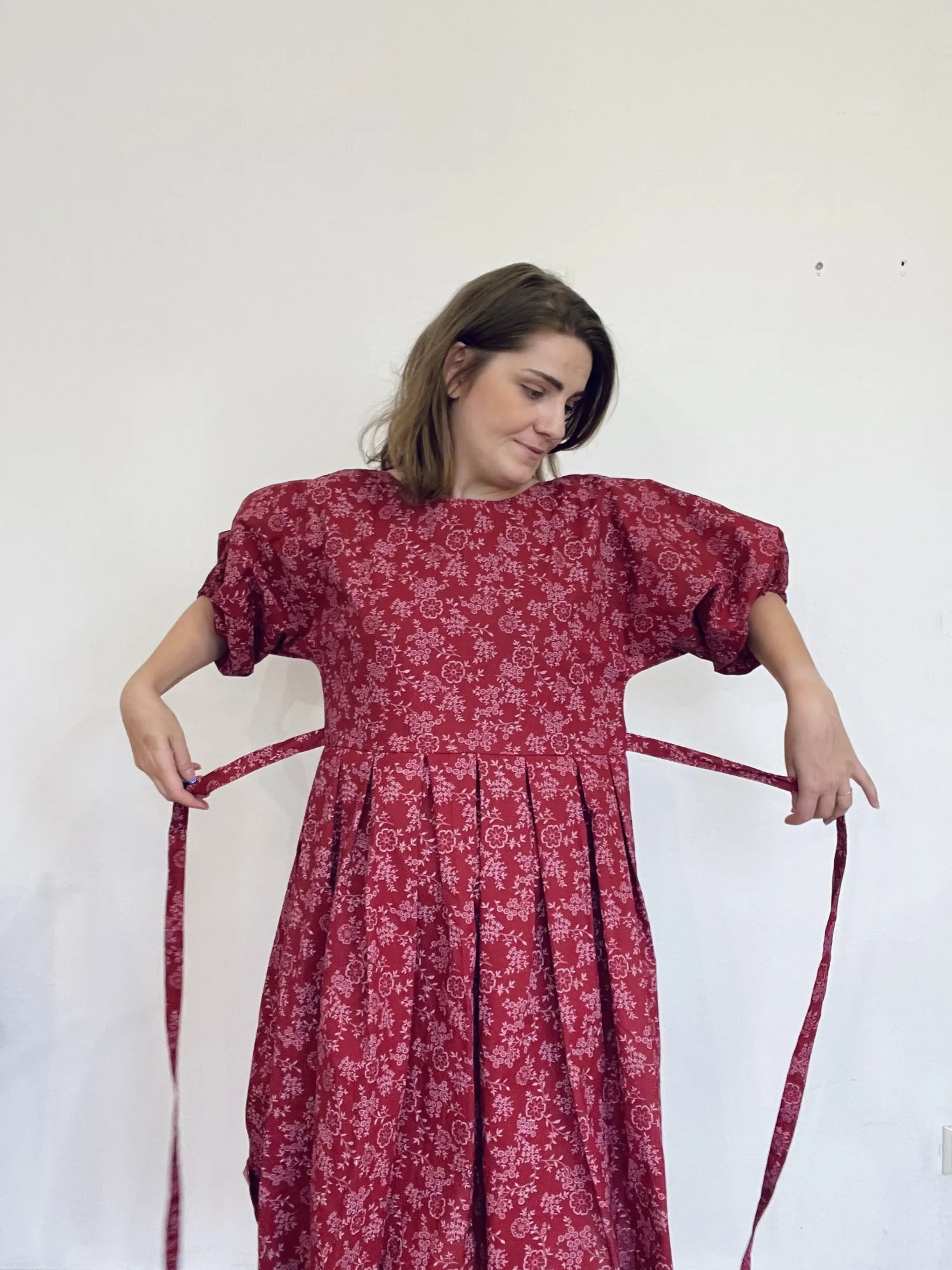 Ester - kvety na červenej